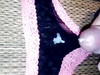 Cumshot on black and pink panty
