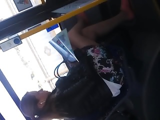 Sluty girl in bus reading book