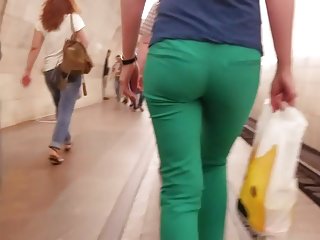 Ass in green pants in the metro